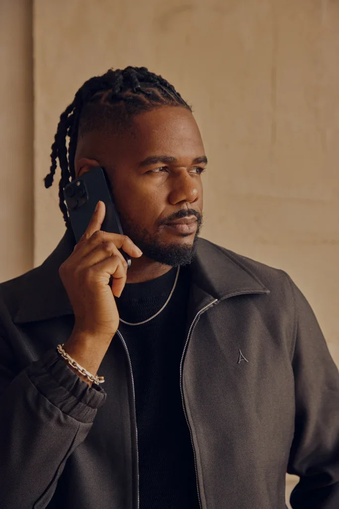 Brandon speaking on a cell phone